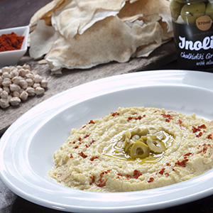 Hummus dip with green olives